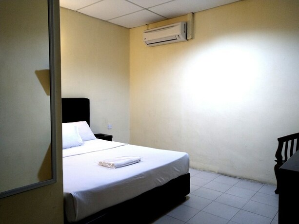 Imagen de la habitación del Hotel Sastria Hotel. Foto 16