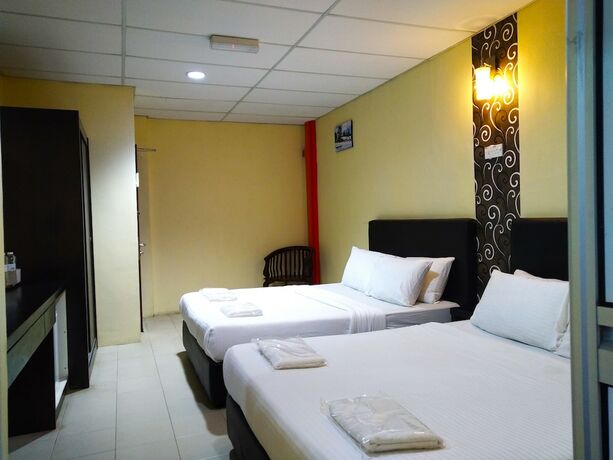 Imagen de la habitación del Hotel Sastria Hotel. Foto 17