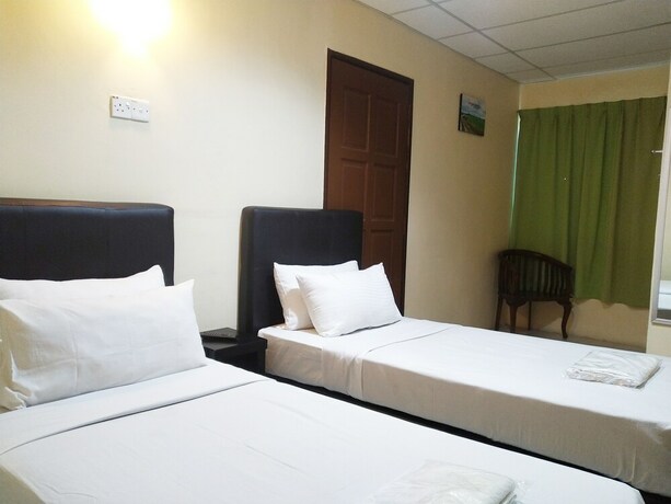Imagen de la habitación del Hotel Sastria Hotel. Foto 18