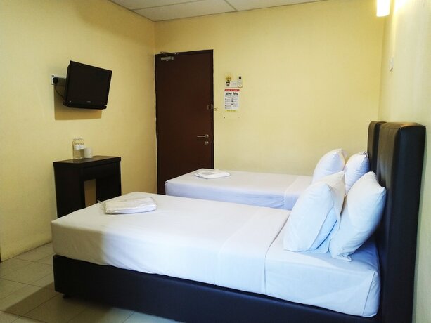 Imagen de la habitación del Hotel Sastria Hotel. Foto 29