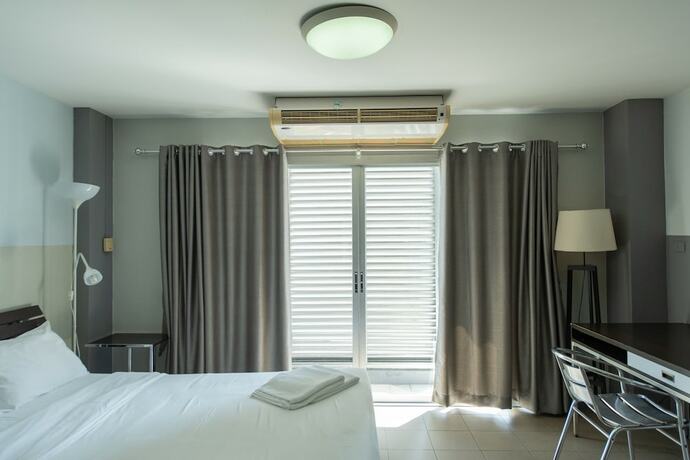 Imagen de la habitación del Hotel Sathorn Terrace Apartment. Foto 32
