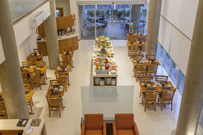 Imagen del bar/restaurante del Hotel S&atilde;o Carlos Marklin Su&iacute;tes. Foto 24