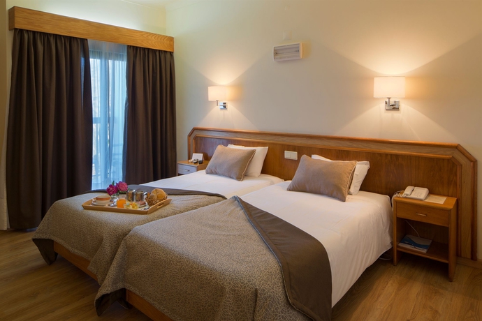 Imagen de la habitación del Hotel São Jorge Garden. Foto 6