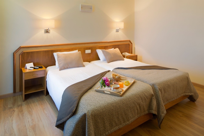 Imagen de la habitación del Hotel São Jorge Garden. Foto 7