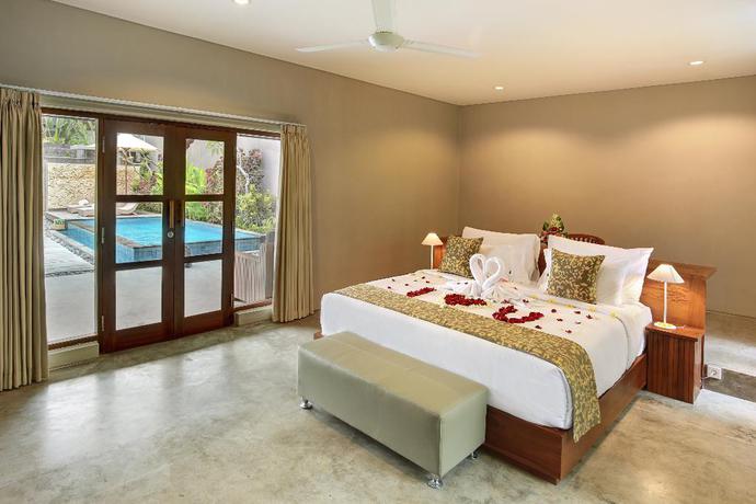 Imagen de la habitación del Hotel Sativa Villas. Foto 10