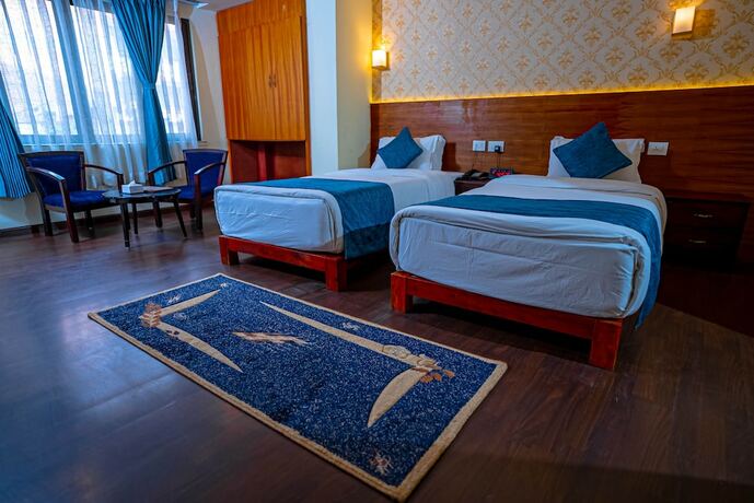 Imagen de la habitación del Hotel Satkar Hotel and Spa. Foto 15
