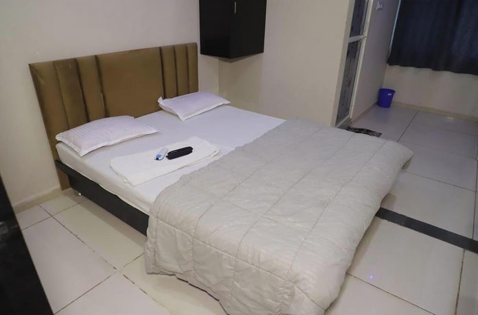 Imagen de la habitación del Hotel Satkar home stay ujjain. Foto 7