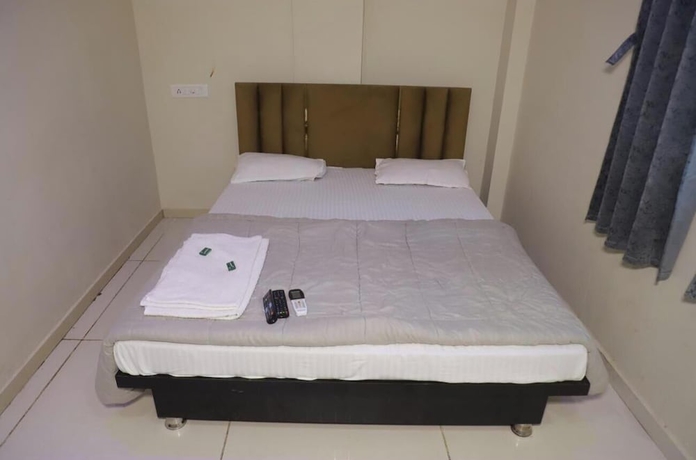 Imagen de la habitación del Hotel Satkar home stay ujjain. Foto 15