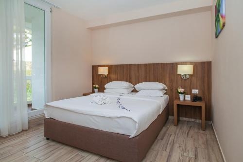 Imagen de la habitación del Hotel Sato. Foto 10