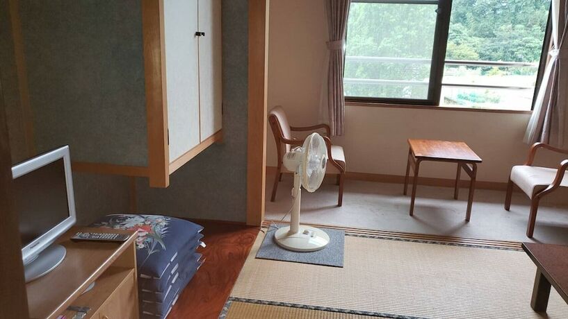 Imagen de la habitación del Hotel Satoji. Foto 14