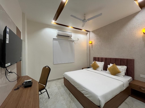 Imagen de la habitación del Hotel Satsang Grand. Foto 11