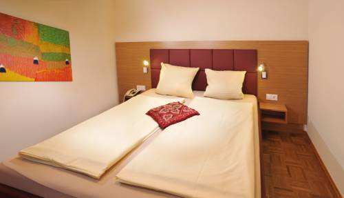 Imagen de la habitación del Hotel Sattlerhof Genie&szlig;erhotel & Weingut. Foto 9