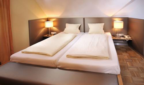 Imagen de la habitación del Hotel Sattlerhof Genie&szlig;erhotel & Weingut. Foto 10