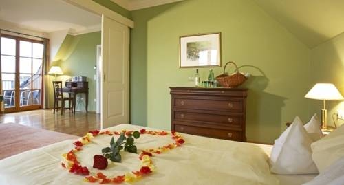 Imagen de la habitación del Hotel Sattlerhof Genie&szlig;erhotel & Weingut. Foto 14