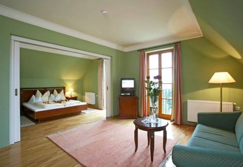 Imagen de la habitación del Hotel Sattlerhof Genie&szlig;erhotel & Weingut. Foto 15