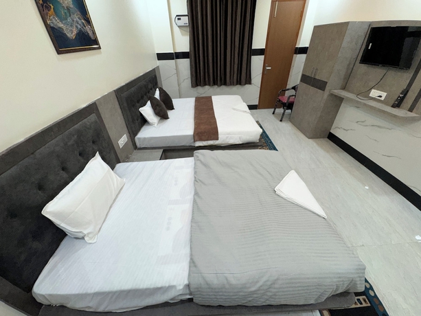 Imagen de la habitación del Hotel Satya Nikunj INN. Foto 3