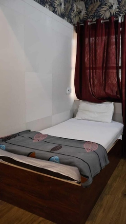 Imagen de la habitación del Hotel Satyam Dham. Foto 11
