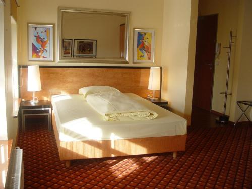 Imagen de la habitación del Hotel Sauerlacher Post, Sauerlach. Foto 6