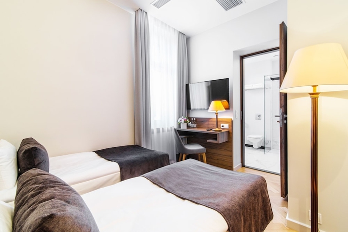 Imagen de la habitación del Hotel Sava Boutique. Foto 6