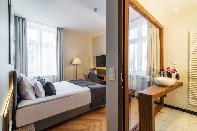 Imagen de la habitación del Hotel Sava Boutique. Foto 15