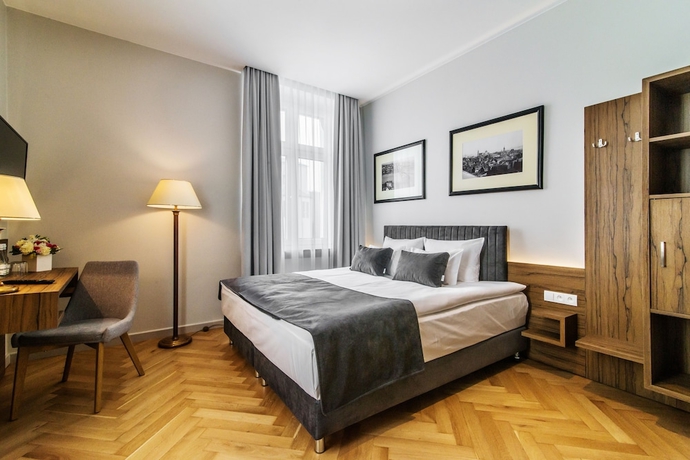 Imagen de la habitación del Hotel Sava Boutique. Foto 17