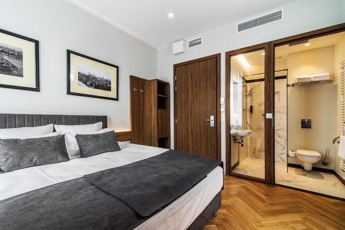 Imagen de la habitación del Hotel Sava Boutique. Foto 18