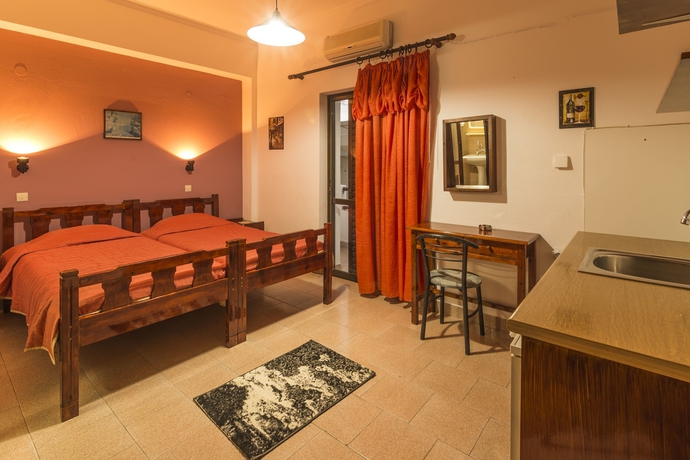 Imagen de la habitación del Hotel Savas Rooms. Foto 13