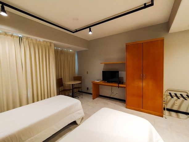 Imagen de la habitación del Hotel Savassi Village. Foto 13