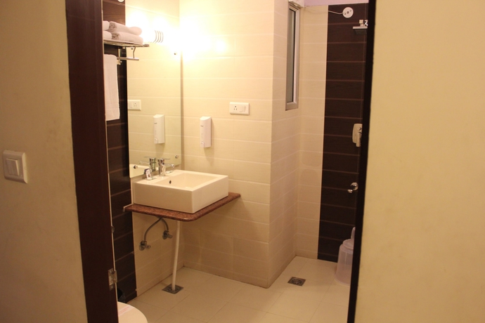 Imagen de la habitación del Hotel Savi Regency. Foto 14