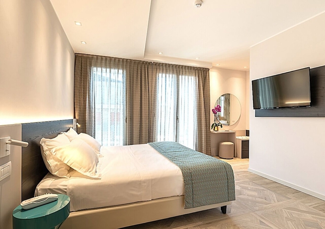 Imagen de la habitación del Hotel Savini, Bellaria-Igea Marina. Foto 4
