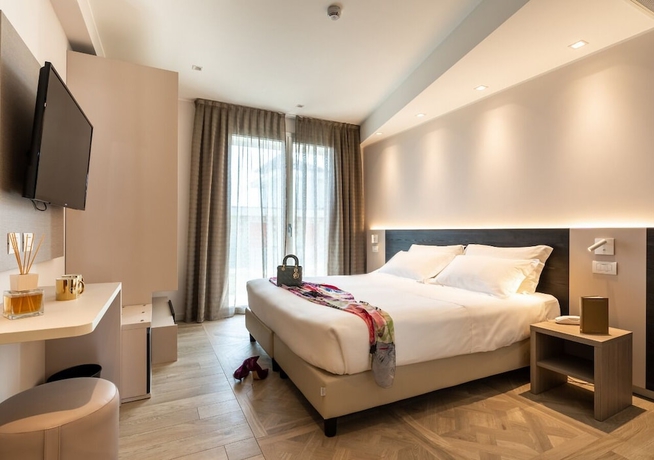 Imagen de la habitación del Hotel Savini, Bellaria-Igea Marina. Foto 6