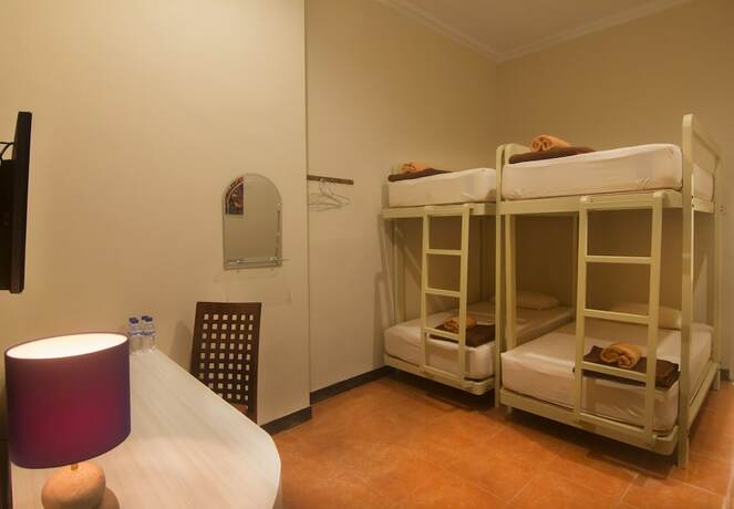 Imagen de la habitación del Hotel Savita Garden Inn. Foto 23