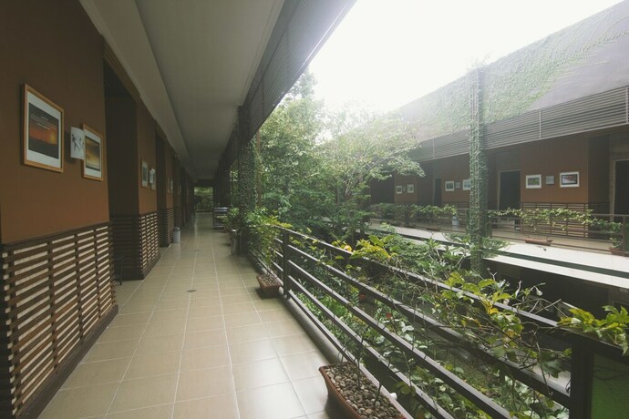 Imagen de la habitación del Hotel Savita Garden Inn. Foto 25