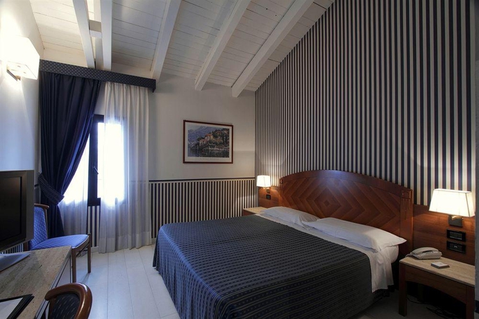 Imagen de la habitación del Hotel Savoia Country House. Foto 7