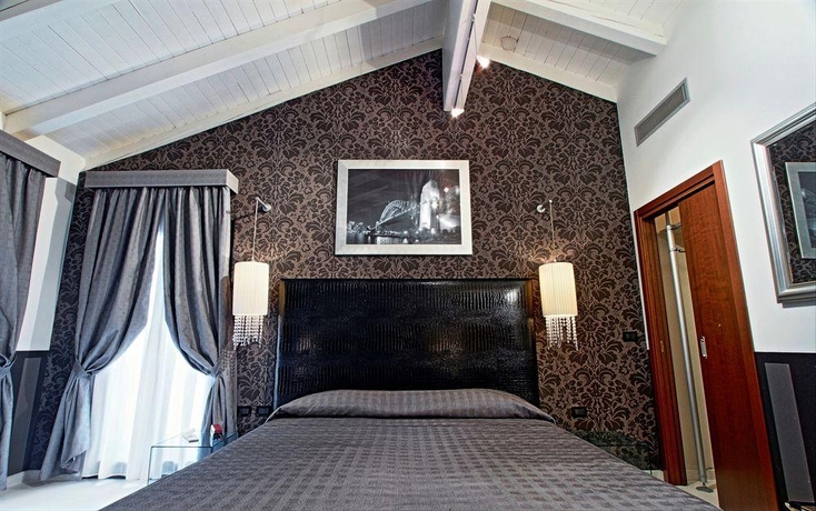 Imagen de la habitación del Hotel Savoia Country House. Foto 8