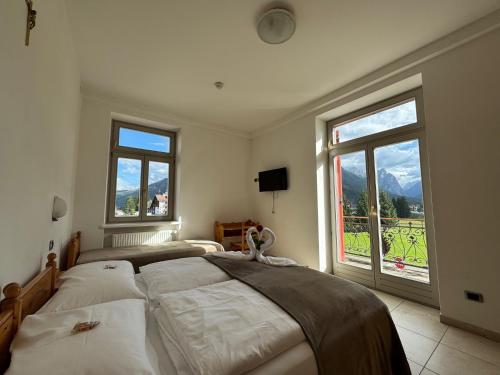Imagen de la habitación del Hotel Savoia, Dobbiaco. Foto 13