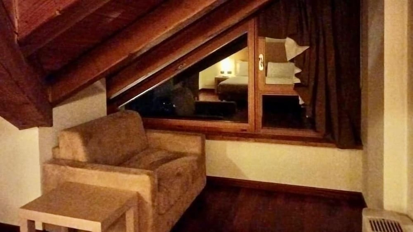 Imagen de la habitación del Hotel Savoia Mountain – Il Resort nel Bosco. Foto 11