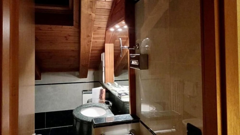 Imagen de la habitación del Hotel Savoia Mountain – Il Resort nel Bosco. Foto 14