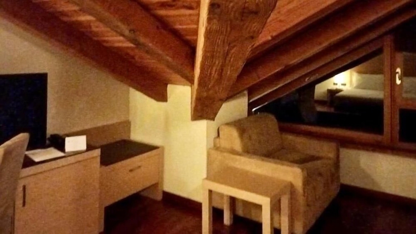 Imagen de la habitación del Hotel Savoia Mountain – Il Resort nel Bosco. Foto 15