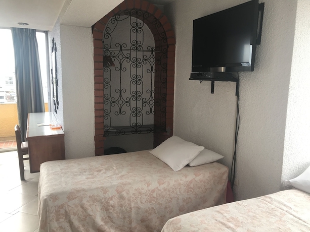 Imagen de la habitación del Hotel Savoy Inn, Quito. Foto 6
