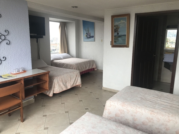 Imagen de la habitación del Hotel Savoy Inn, Quito. Foto 7