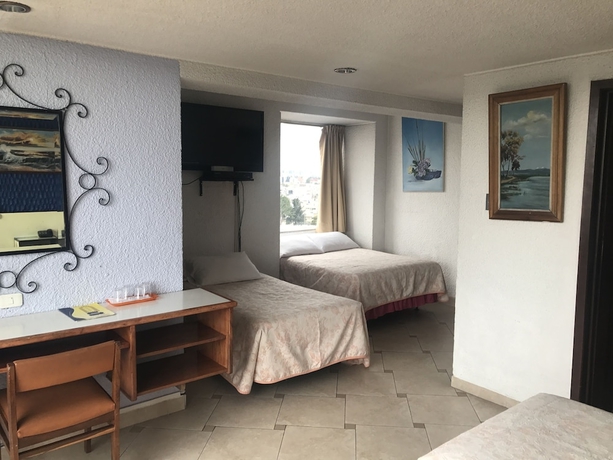 Imagen de la habitación del Hotel Savoy Inn, Quito. Foto 14
