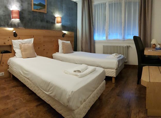 Imagen de la habitación del Hotel Savoy, Saint-Michel-de-Maurienne. Foto 18