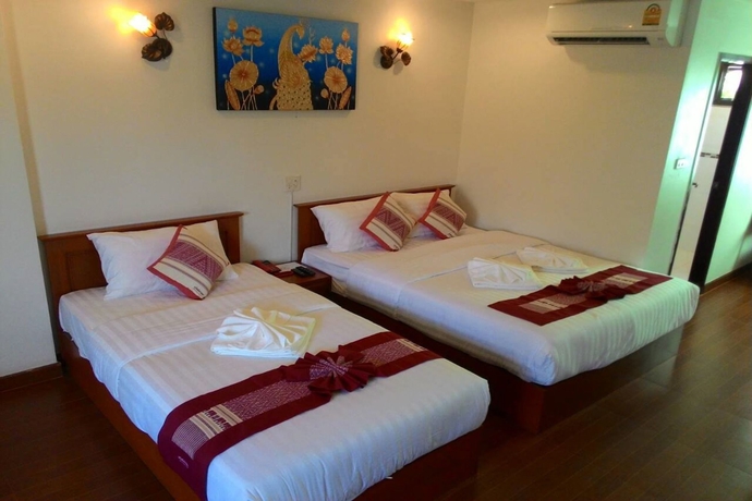 Imagen de la habitación del Hotel SawadeeLanna. Foto 10