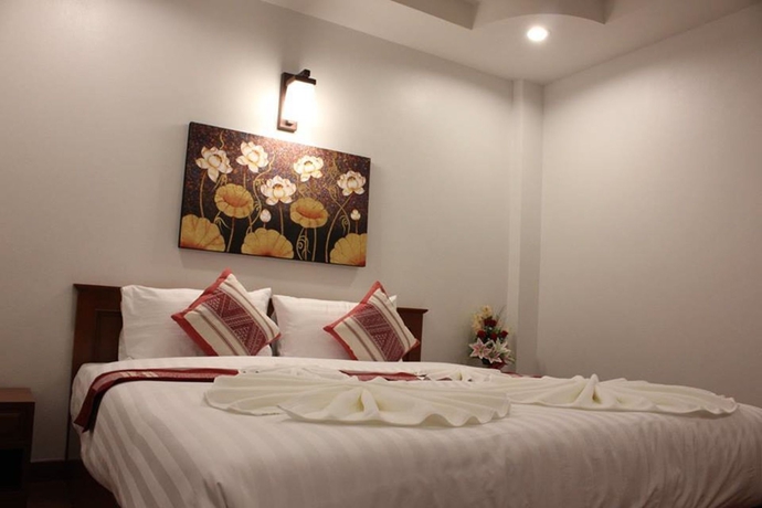 Imagen de la habitación del Hotel SawadeeLanna. Foto 11