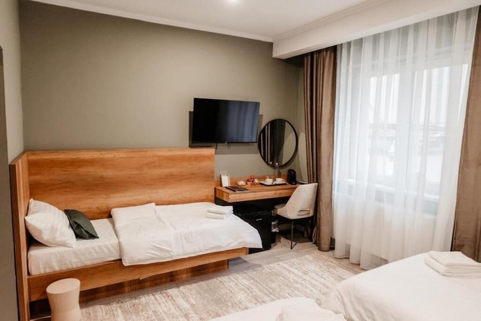 Imagen de la habitación del Hotel Sawei Urban. Foto 6