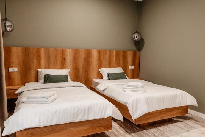 Imagen de la habitación del Hotel Sawei Urban. Foto 7