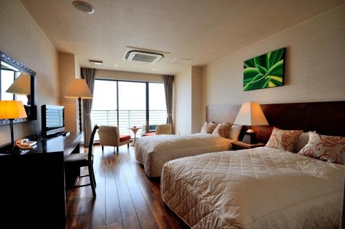 Imagen de la habitación del Hotel Sayan Terrace and Resort. Foto 6