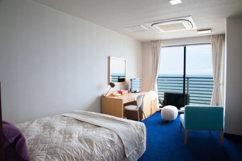 Imagen de la habitación del Hotel Sayan Terrace and Resort. Foto 8