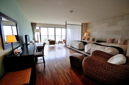 Imagen de la habitación del Hotel Sayan Terrace and Resort. Foto 9